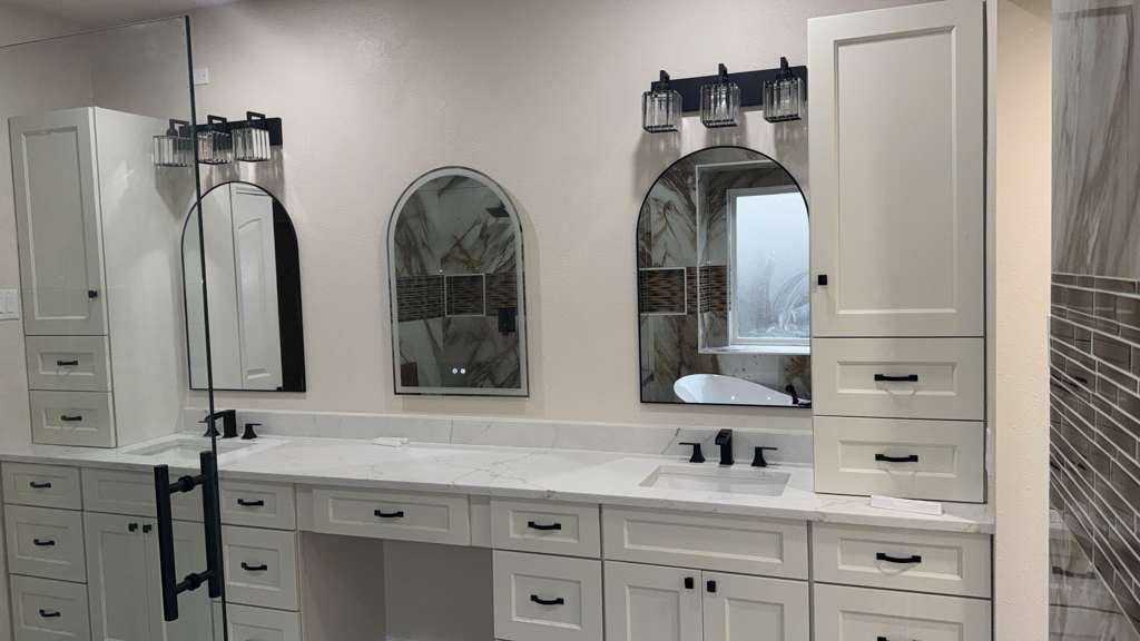 Custom double vanity with arched mirrors and quartz countertops